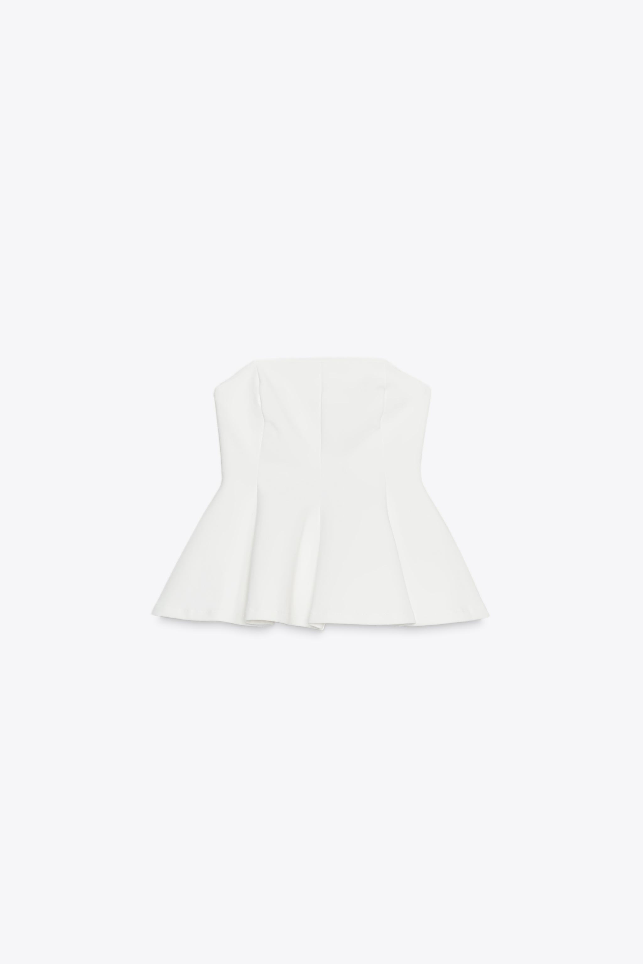 INTERLOCK PEPLUM TOP